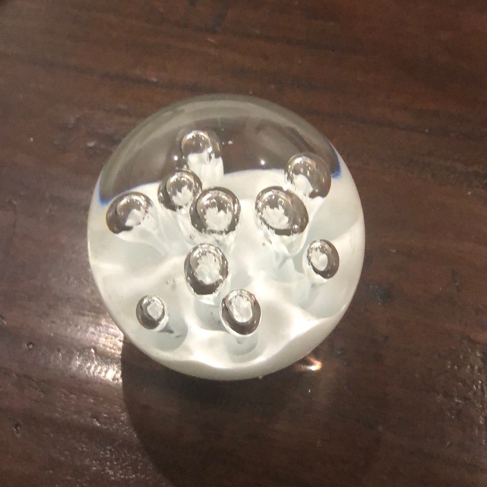 Glass, blown paper weight w/controlled bubbles.